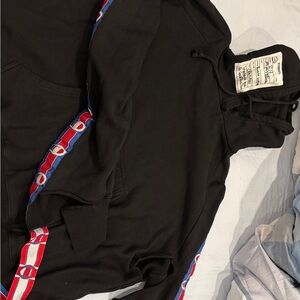 Champion X Vetement Black Hoodie with Red and Blue Logo Stripes